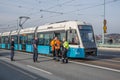 Service technician working with a tram.