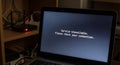 Service unavailable error on laptop with internet router in the background Royalty Free Stock Photo