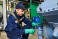 Service worker at industrial compressor station Royalty Free Stock Photo