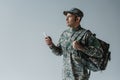 serviceman in cap and army uniform