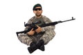 Serviceman sitting down with a sniper riffle Royalty Free Stock Photo