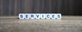 Services boggle word cubes on dark background