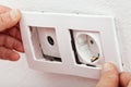 Servicing an electrical wall fixture Royalty Free Stock Photo