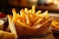 Serving basket filled with golden and perfectly crispy French fries. The lighting is warm and inviting, highlighting the texture