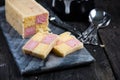 Serving Battenberg checked cake Royalty Free Stock Photo