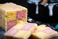 Serving Battenberg checked cake Royalty Free Stock Photo