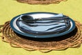 Serving blue plates and cutlery (knives, forks, spoons) Royalty Free Stock Photo