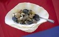 Serving Boiled various shells in the shell of a large clam Royalty Free Stock Photo