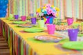 Serving colorful table with decoration for child birthday