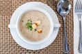 Serving of cream wild mushroom soup at restaurant