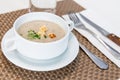 Serving of cream wild mushroom soup at restaurant