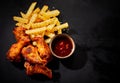 Serving of crispy spicy grilled chicken wings Royalty Free Stock Photo