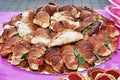 Serving dish with many stuffed salted croissants