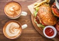 Serving fast food and two cups of coffee Royalty Free Stock Photo