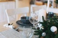 Serving festive table, grey plates, minimalism, scandinavian design at living room Royalty Free Stock Photo