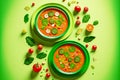 serving green plates for delicious bright spanish dish in form of gazpacho