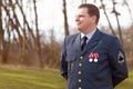 Serving his country. Shot of a high ranking military officer standing at ease in the outdoors. Royalty Free Stock Photo