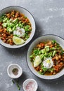 Serving lunch vegetarian buffalo chickpea chili with mushrooms on a gray background, top view. Healthy vegetarian food