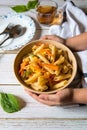 Serving pasta on a table