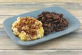 Serving plate of dinner for two of mashed potatoes and beef brisket Royalty Free Stock Photo