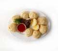 Serving of puff khinkal with two pieces of roasted beef and boiled potatoes, top view