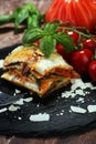 Serving of spicy traditional Italian beef lasagne in a restaurant Royalty Free Stock Photo