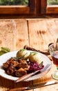 Serving of spicy wild venison goulash with herbs Royalty Free Stock Photo