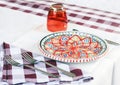 Serving on the table on terrace in the restaurant in Catania, Sicily, Italy, setting for diner Royalty Free Stock Photo