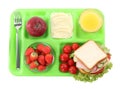 Serving tray of healthy food isolated on white, top view. School lunch Royalty Free Stock Photo