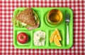 Serving tray with healthy food on tablecloth, top view Royalty Free Stock Photo