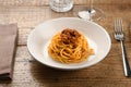 Serving of wild boar ragout on spaghetti Italian pasta