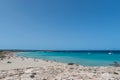 People on the coast of Ses Illetes beach in Formentera, Balearic Islands in Spain