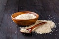 Sesam seeds in a little bowl on wooden table