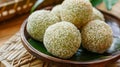 Sesame balls in bowl on bamboo mat Royalty Free Stock Photo