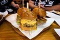 Sesame bun hamburgers filled with Wagyu beef and soft shell crab