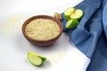 Sesame celulose in ceramic bowl, green apples isolated on white Royalty Free Stock Photo