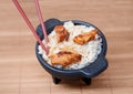 Sesame chicken in a black bowl Royalty Free Stock Photo