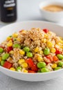 Sesame Chicken Rice Bowl with Corn and Edamame Royalty Free Stock Photo