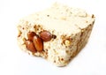 Sesame halva with almonds on white background