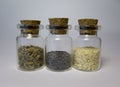 Sesame, poppy and caraway seeds in banks Royalty Free Stock Photo