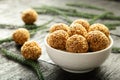 Sesame seed balls in a white bowl