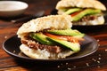 sesame seed bun sandwich with avocado and roast beef Royalty Free Stock Photo