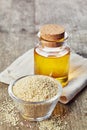 Sesame seed oil and sesame seeds Royalty Free Stock Photo