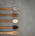 Sesame seed in wooden spoon. Black and white sesame set up on wo