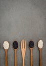 Sesame seed in wooden spoon. Black and white sesame set up on wo