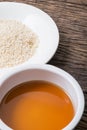 Sesame seeds oil and sesame seeds Royalty Free Stock Photo