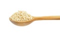 Sesame seeds on wooden spoon isolated on white background Royalty Free Stock Photo
