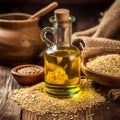 Sesame vegetable oil with grains and fields background, vegetarian dressing for salads and cooking.