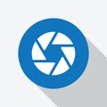 White grinding wheel icon in blue circle.