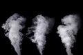 Set of abstract white smoke against dark background Royalty Free Stock Photo